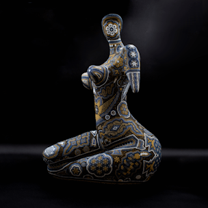 Aphrodite body sculpture covered with black and gold beads