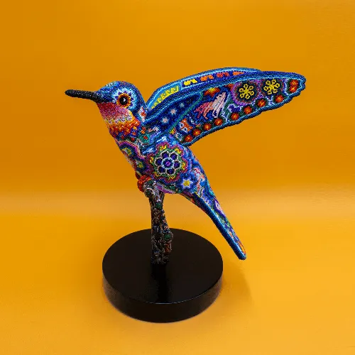 Escultura de Colibri arte huichol rama a