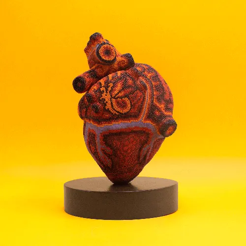 Figura de corazon arte huichol rojo g
