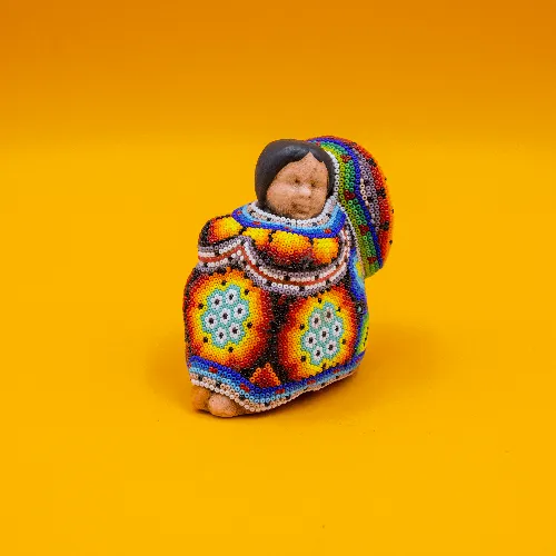Escultura de Panchito arte huichol naranja