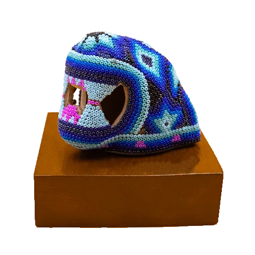 Escultura de Reconocimiento con arte huichol cabeza de jaguar en base azul
