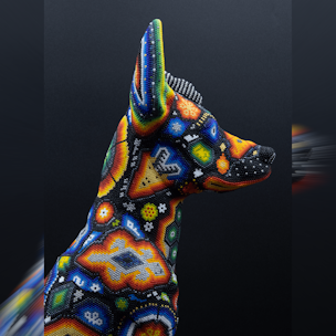 Xoloitzcuintle dog sculpture covered with colorful beads