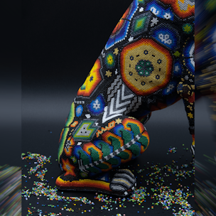 Xoloitzcuintle dog sculpture covered with colorful beads
