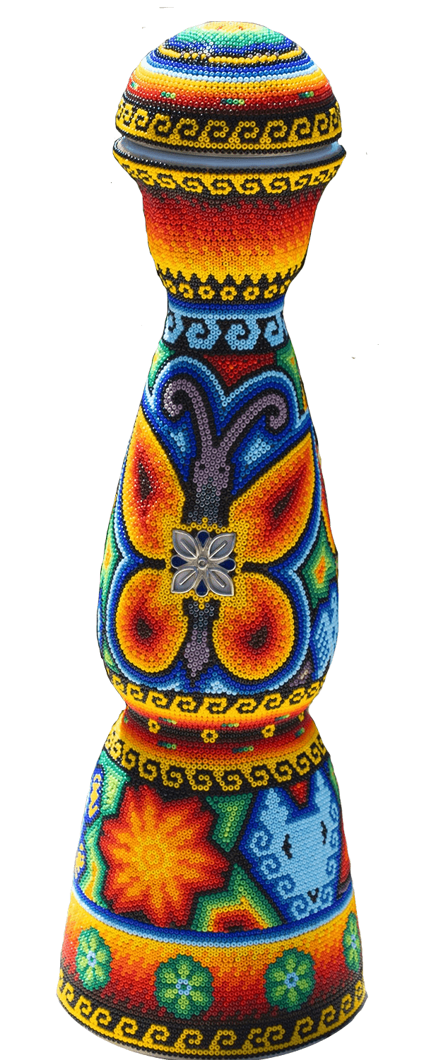 Clase azul tequila bottle covered with colored beads