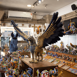 Blue and gold griffin sculpture