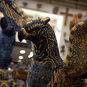 Blue and gold griffin sculpture