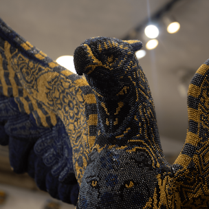 Blue and gold griffin sculpture